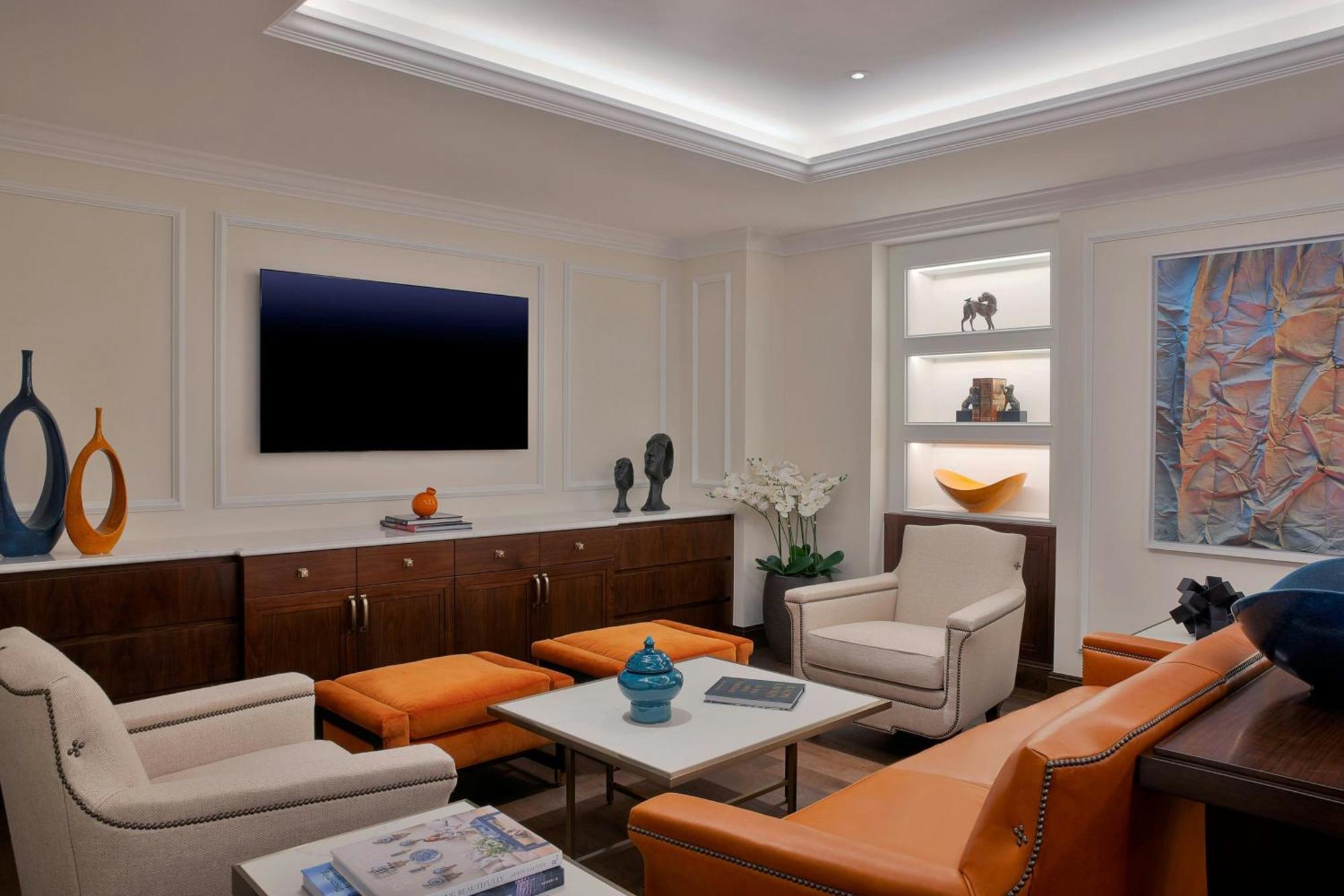 Hotel The Ritz-Carlton, Amman Esterno foto A living room with indirect lighting